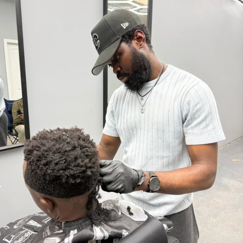 Expert hair styling in progress at DR COIFFURE Winnipeg Expert hair styling in progress at DR COIFFURE Winnipeg