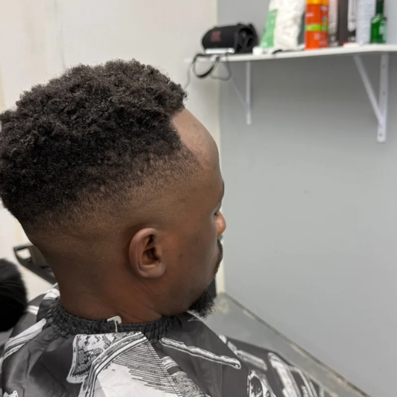 Men's fade haircut at DR COIFFURE hair salon Winnipeg Men's fade haircut at DR COIFFURE hair salon Winnipeg
